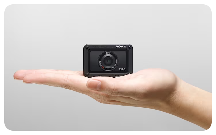 person Sony RX0 II Camera in the palm of their hand